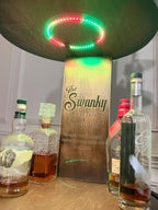 Motorized Pop Up Bourbon Barrel Cabinet.  Remote control & LED lighting.  Works with Alexa and Google Home. Custom engraving available.